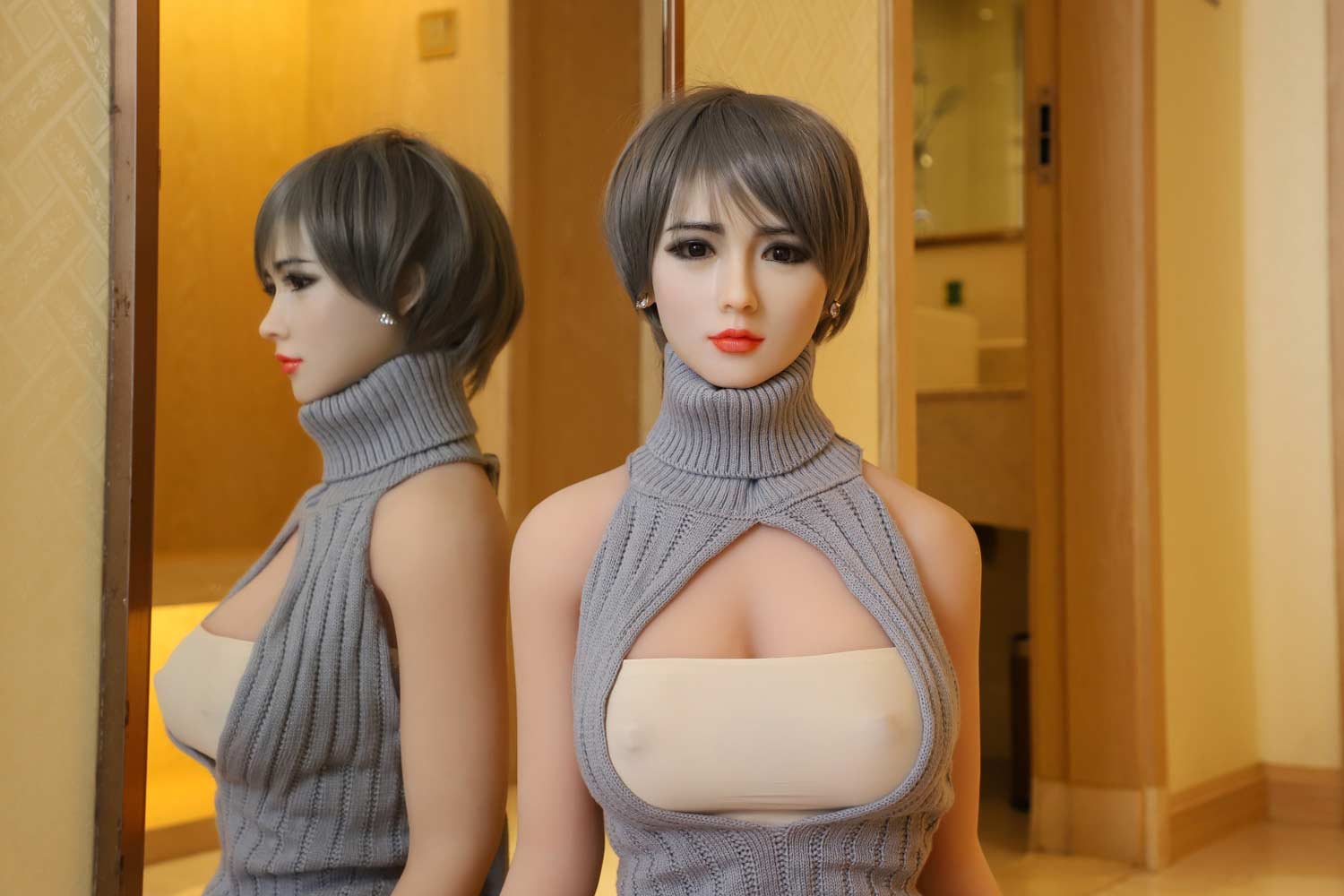Silicone sex doll in gray sweater